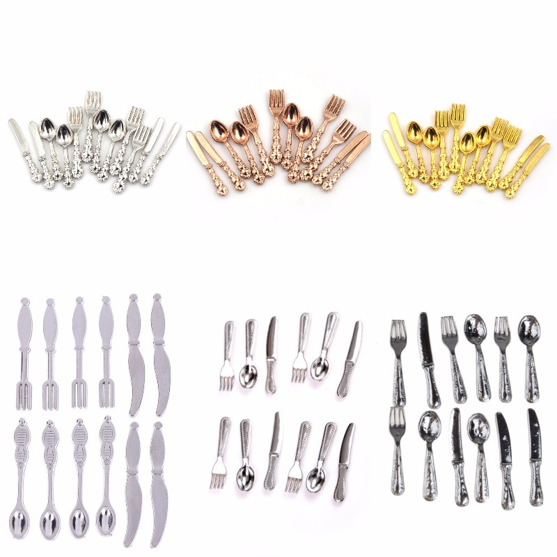 Twelve miniature vintage gold and silver metal cutlery sets for dollhouses.